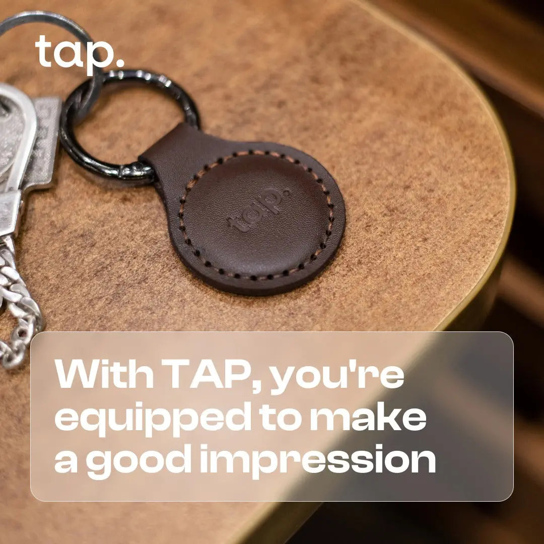 Brown NFC leather keychain embedded "tap.", with text "With TAP, you're equipped to make a good impression".