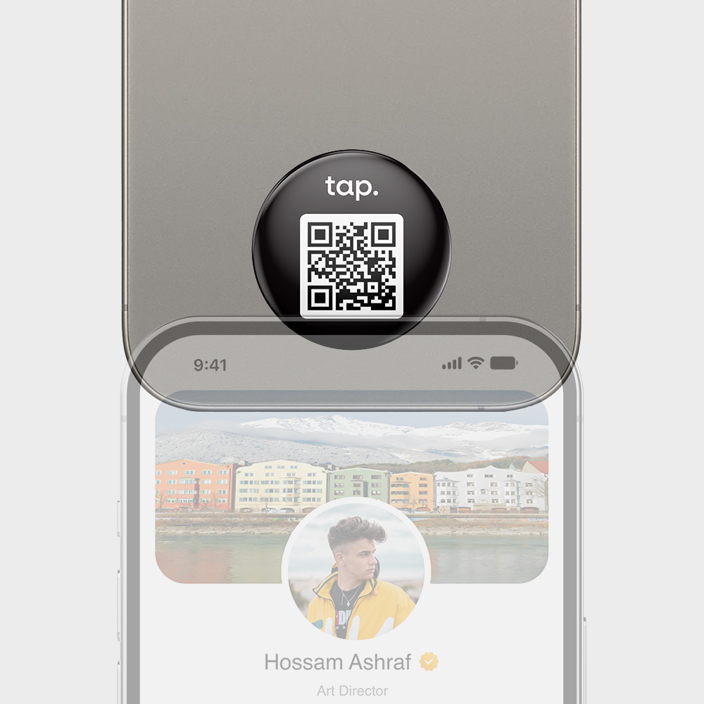 Smartphone displaying profile and QR code keychain attached above