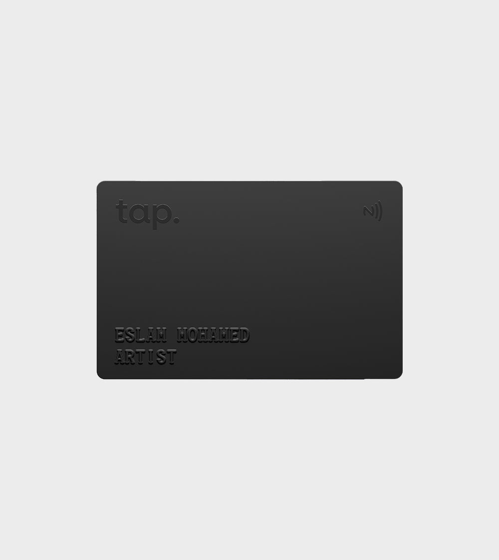 Black business card with NFC chip and embossed text Eslam Mohamed Artist."