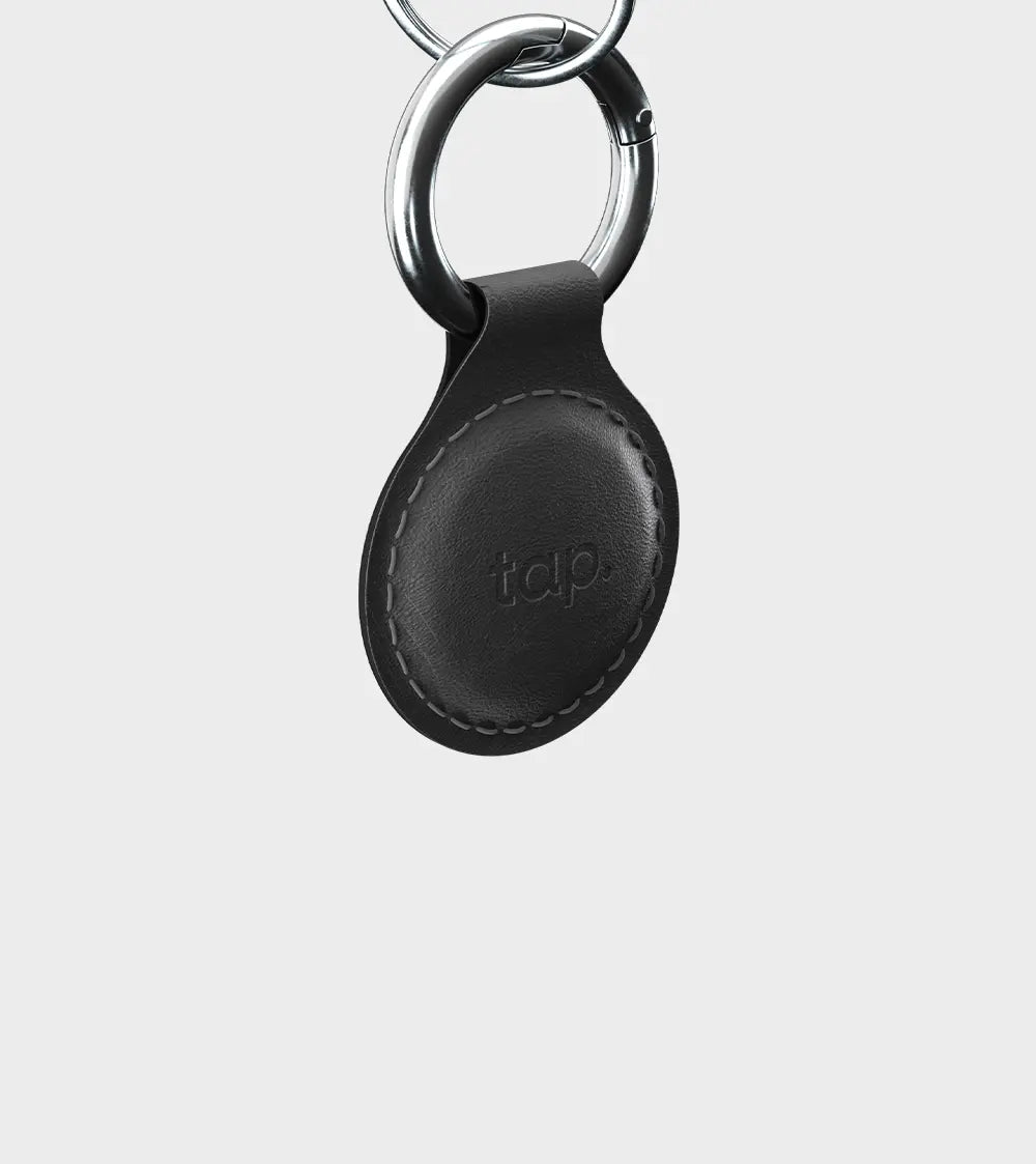 Black leather keyring with silver ring and tap logo on a white background.