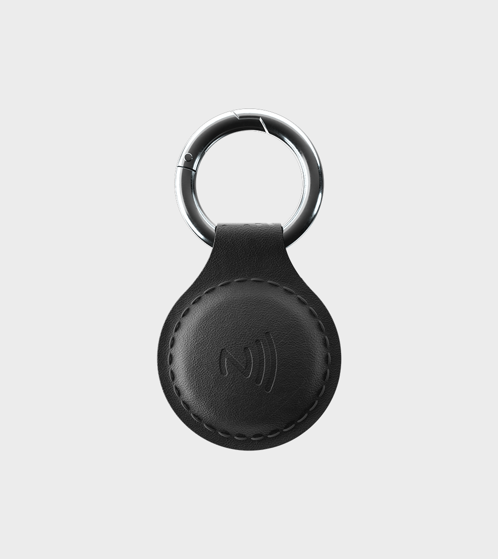 Black leather keyring with NFC symbol and metal ring on a white background.