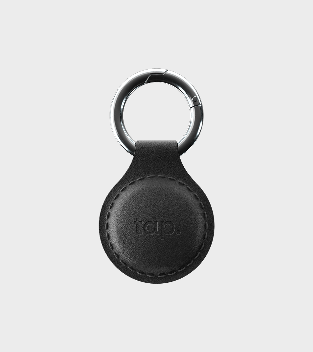 Black leather keyring with metal clasp and tap logo on white background.