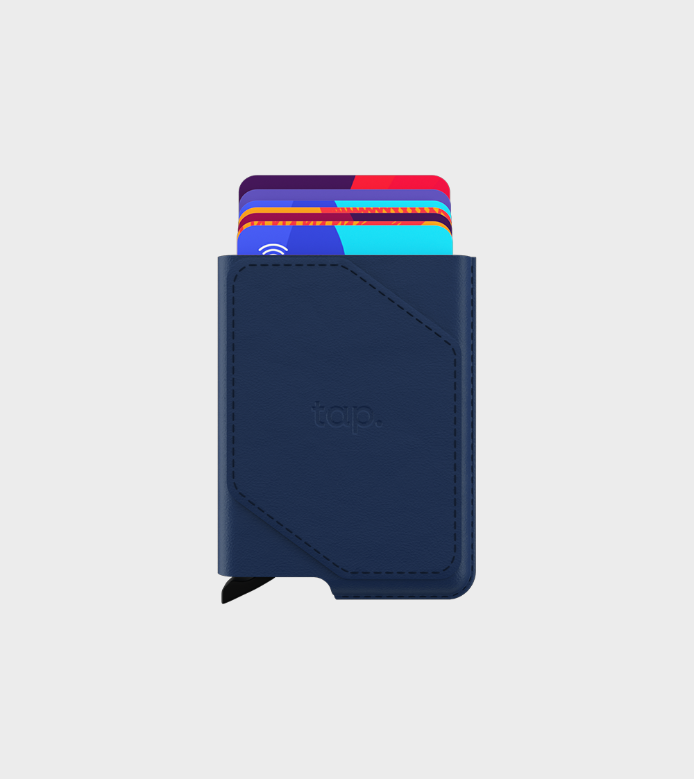 Navy blue slim wallet with contactless cards peeking out, isolated on white background.
