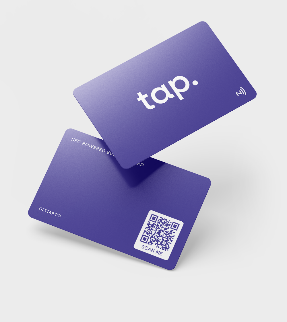 Stylish purple NFC business cards overlapped on a surface