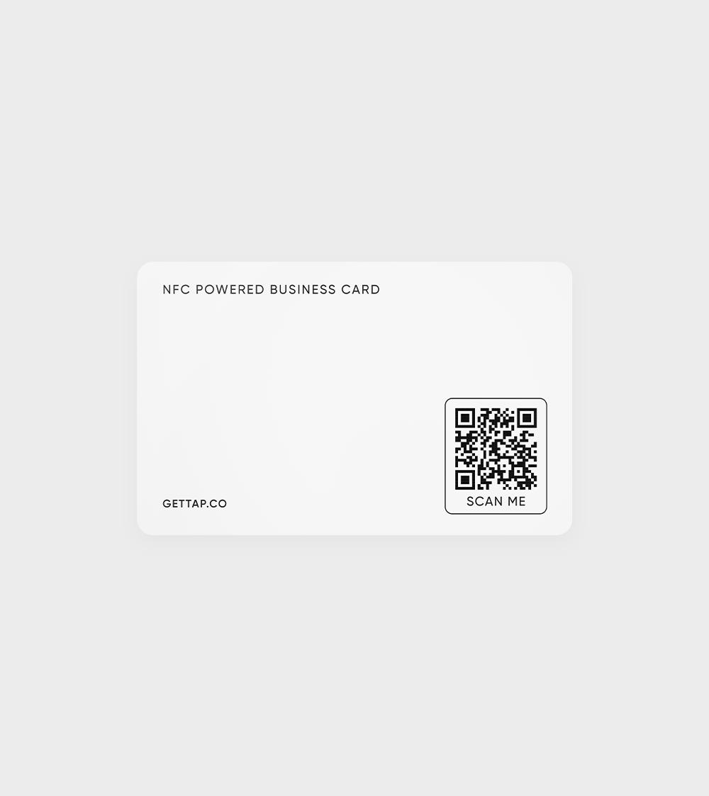 NFC business card on a white surface displaying QR code