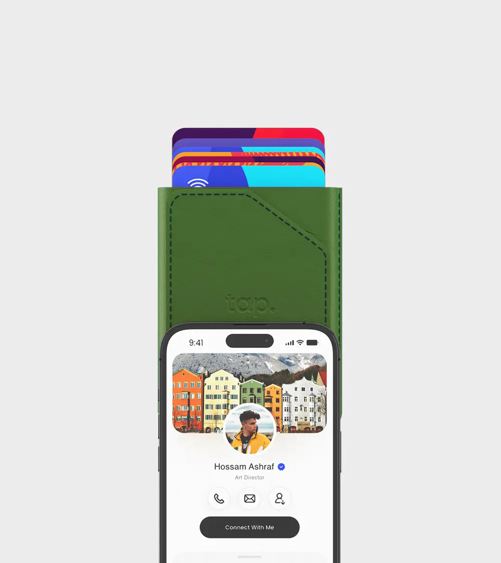 Smartphone with personal profile on screen above a digital wallet case with colorful cards"