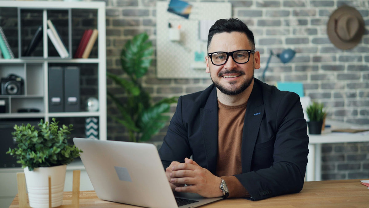 A sales manager at his laptop