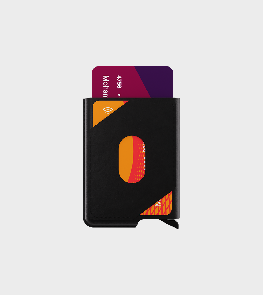 Black leather wallet with a contactless credit card protruding - essential money accessory.