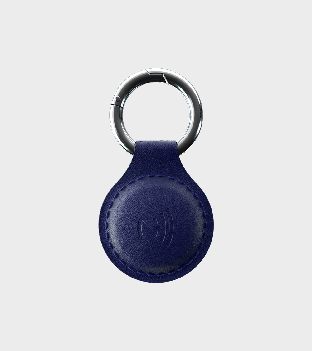 Stylish blue key fob with contactless payment symbol and stitching detail on clean background.
