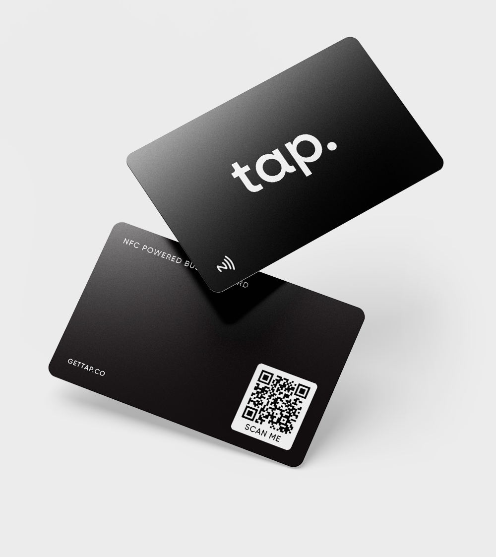 Angled view of purple NFC business cards with tap logo