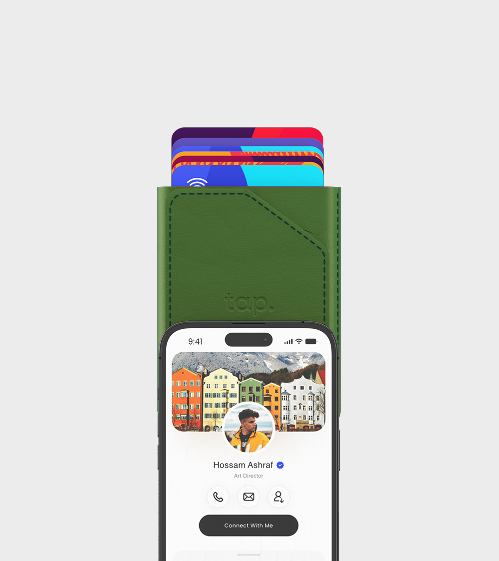 Smartphone with personal profile on screen above a digital wallet case with colorful cards"
